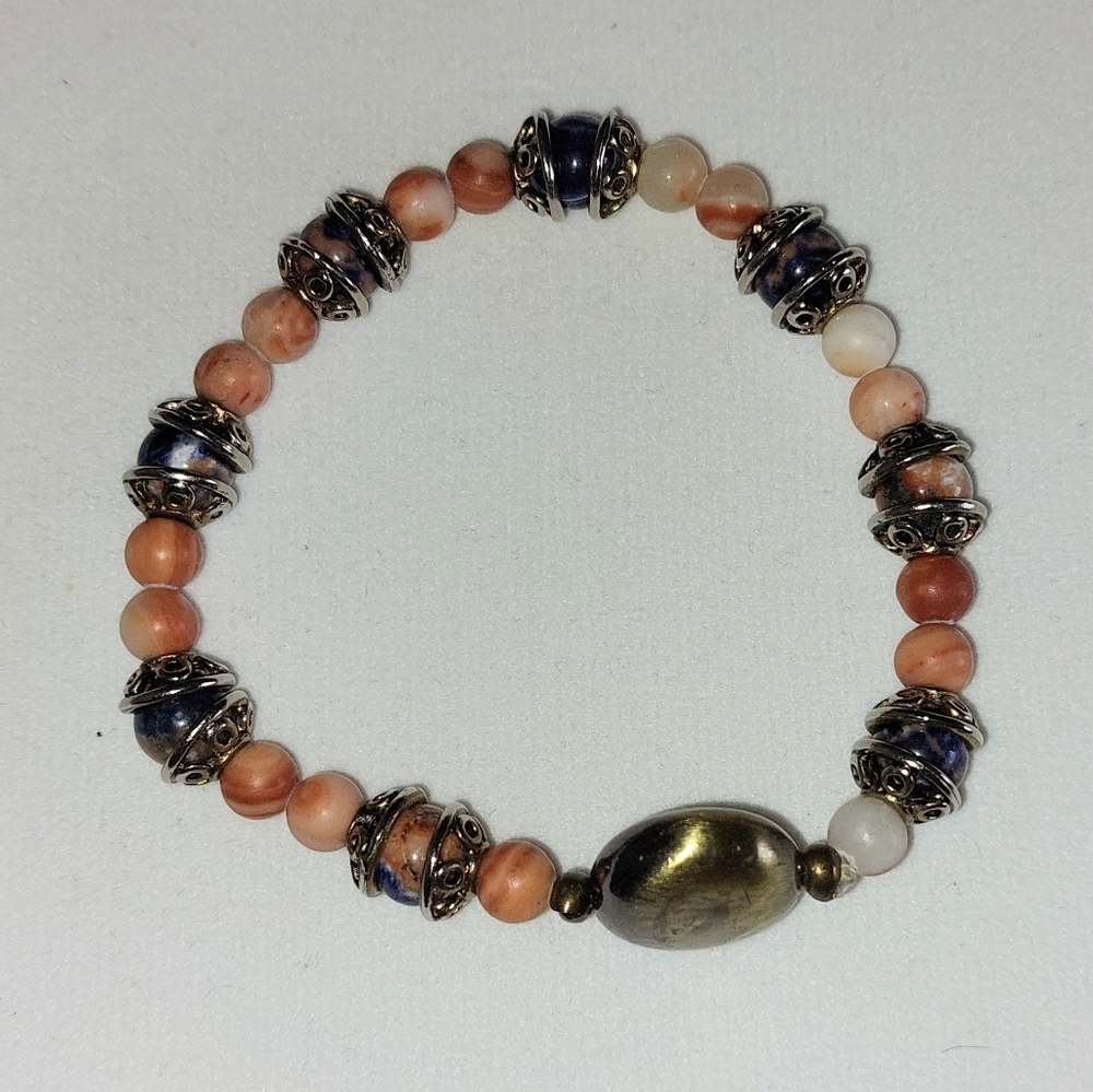 Stretch bracelet of jasper beads with metal